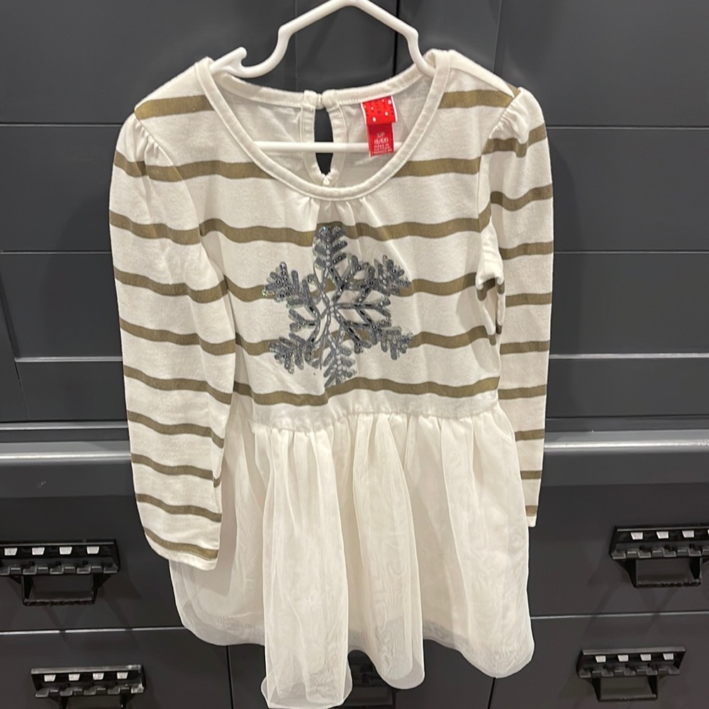 Girls dress with jeweled snowflake detail.